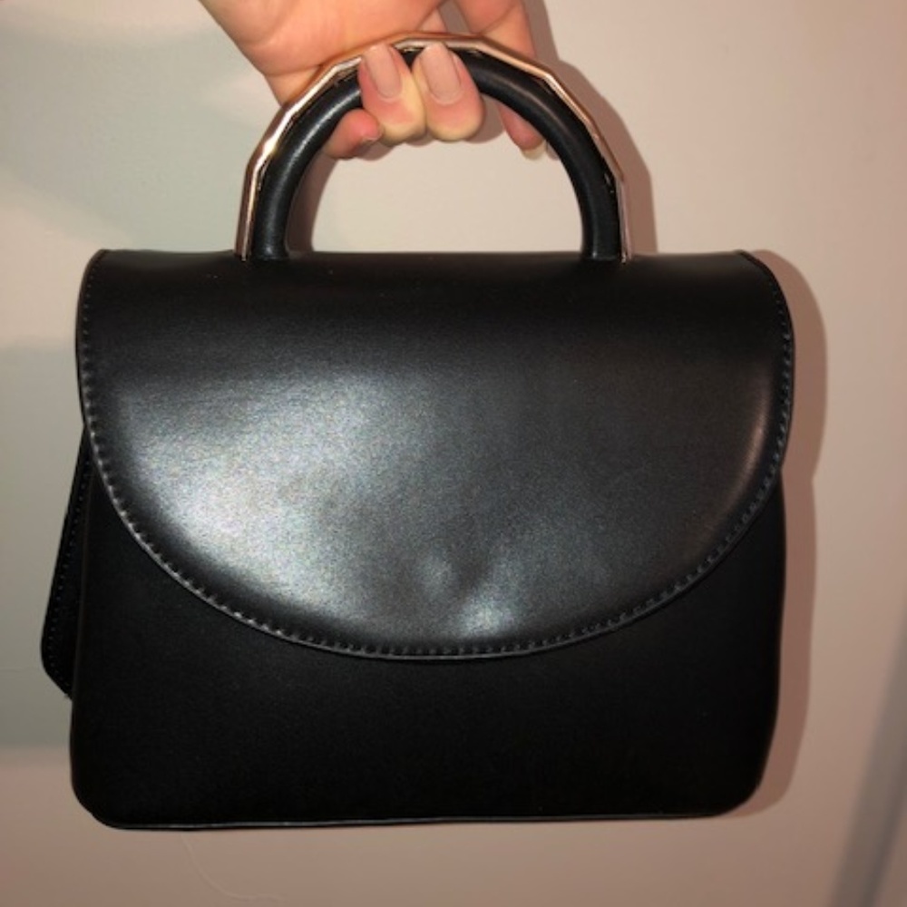 Small Black Handbag with Gold Metal Accents